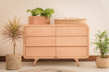 Handcrafted Love Local Niki hardwood compactum made from natural Beechwood, featuring six soft-close drawers and curved edges for a warm, elegant nursery aesthetic.