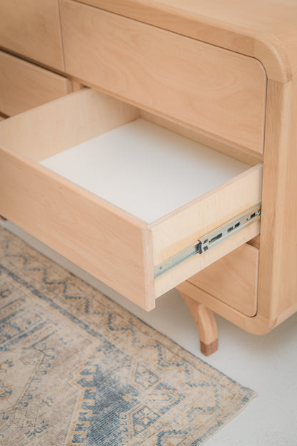 Handcrafted Love Local Niki hardwood compactum made from natural Beechwood, featuring six soft-close drawers and curved edges for a warm, elegant nursery aesthetic.